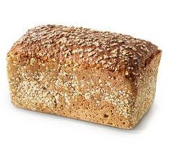KI generiert: Das Bild zeigt ein rundes, rustikales Vollkornbrot mit einer knusprigen Kruste. Der Hauptinhalt ist das Brot, das auf einem hellen Hintergrund präsentiert wird.