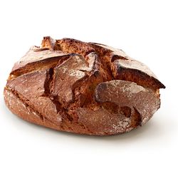 KI generiert: Das Bild zeigt ein rundes, rustikales Vollkornbrot mit einer knusprigen Kruste. Der Hauptinhalt ist das Brot, das auf einem hellen Hintergrund präsentiert wird.