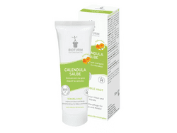 KI generiert: Das Bild zeigt eine Flasche Geschirrspülmittel der Marke Sonett mit Calendula-Extrakt. Die Verpackung hebt hervor, dass das Produkt 100% biologisch abbaubar und aus pflanzlichen Tensiden hergestellt ist.