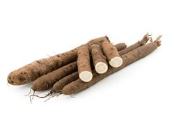 KI generiert: Das Bild zeigt einen violetten Kohlrabi mit grünen Blättern. Der Kohlrabi liegt auf einem weißen Hintergrund.